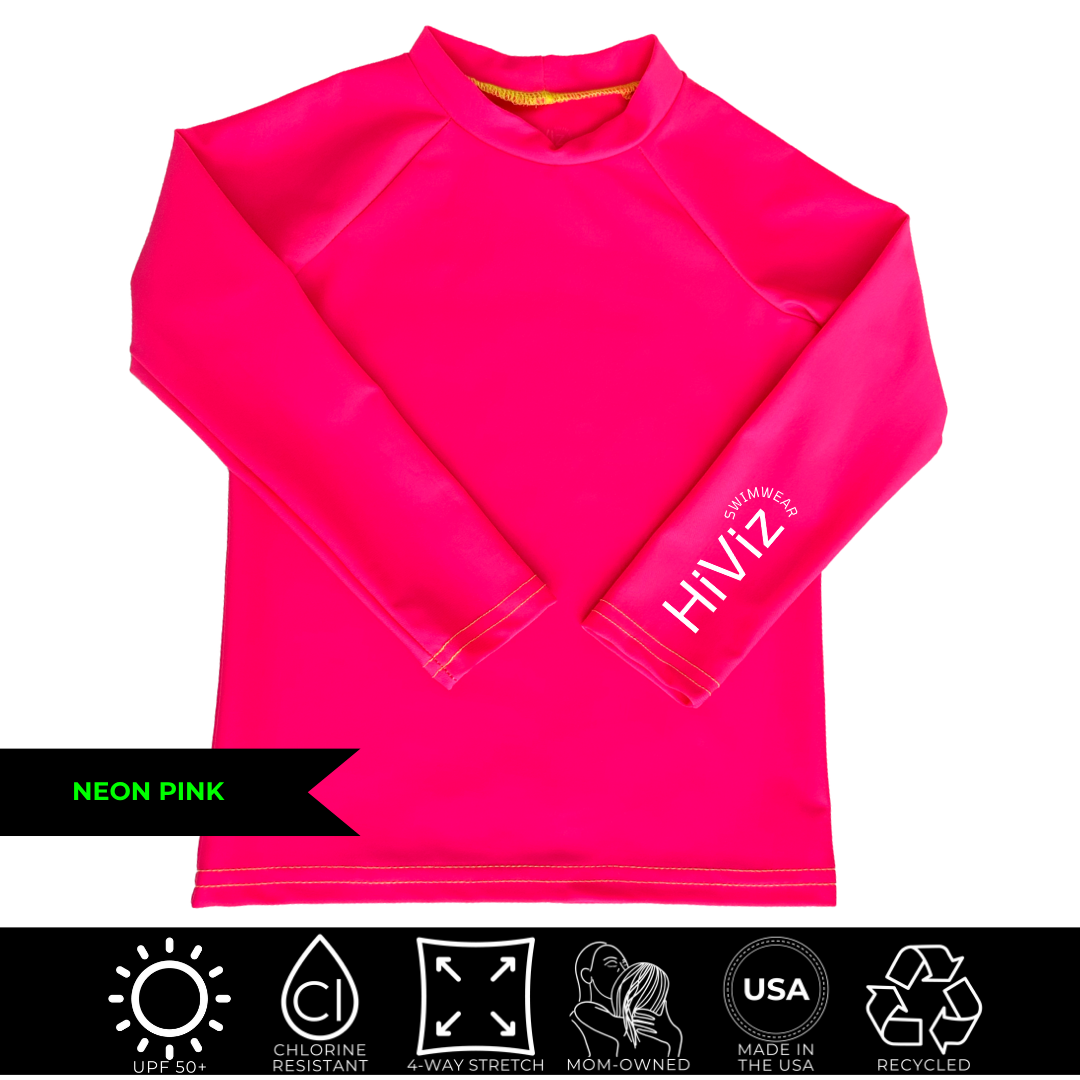 Bright swimwear for toddlers, a neon pink rash guard product image with HiViz bright swimwear log on left sleeve.